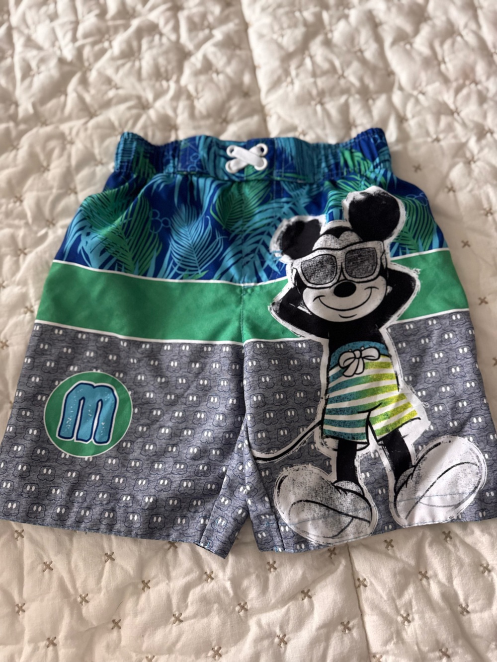 Disney Black Swim Shorts with Teal Stitching and Blue Tag